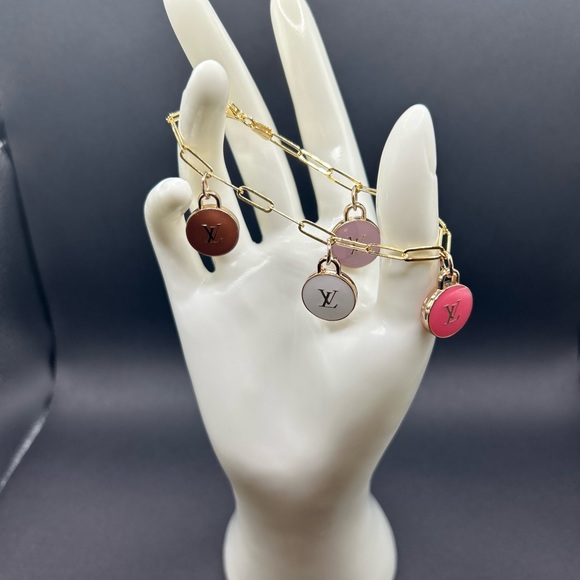 Upcycled  bracelet with 4 LV zipper pull charms on 925 sterling silver bracelet - Picture 3 of 5